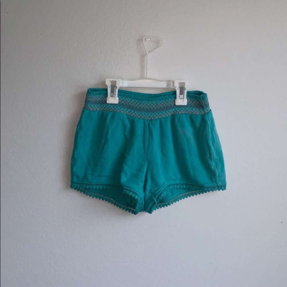 bright turquoise shorts